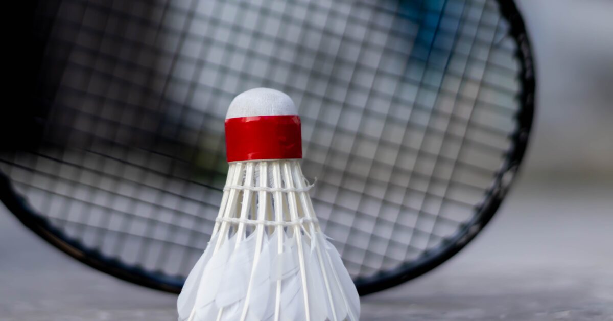 A badminton racquet and birdie