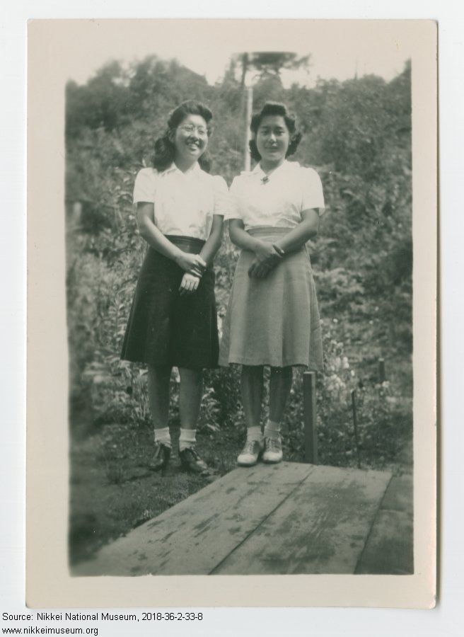 Black and white phot of two women Mariko Tokunaga and Kazuko Shinobu. One of the photos from the Eiji Yatabe Collection.