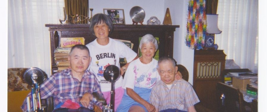 Atsushi, Teruko, Michiyo and Masayuki Uyeda in Front of Piano; Nakusp, BC; 15 July 2001. Uyeda Family of Nakusp collection. NNMCC 2025.1.3.4.54.